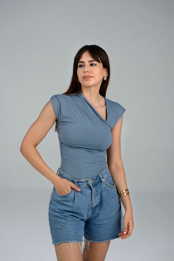 Top asymétrique Lyra
