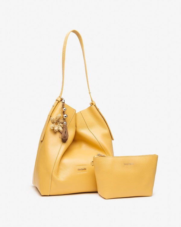 Sac hobo jaune accompagné de sa pochette assortie